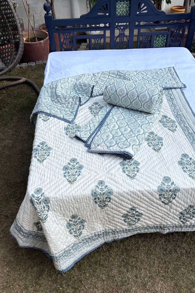 Luxury reversible quilt in soft aqua and ivory with classic Indian buti motifs