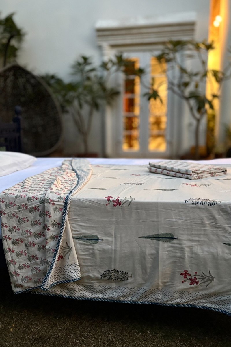 Traditional Indian block printed dohar in ivory with botanical buta and zigzag border detailing