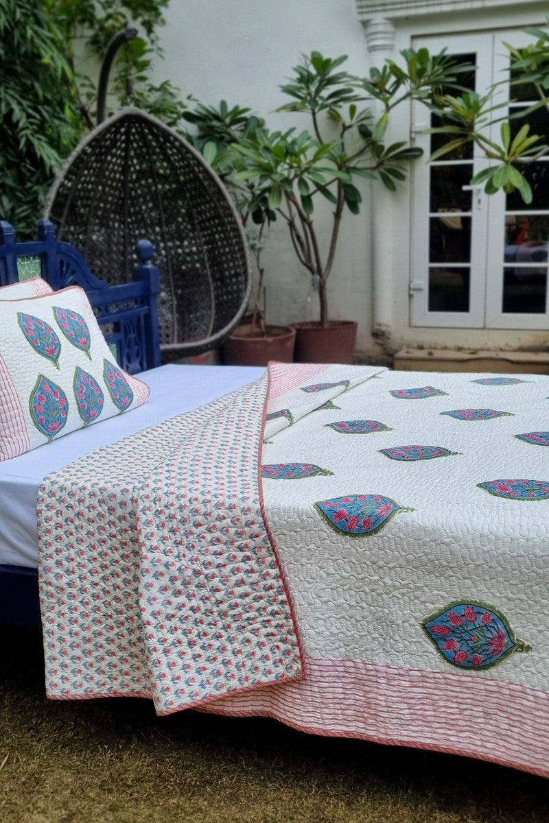 Indian artisan handblock quilted bedcover with pillows with teal and pink garden motif
