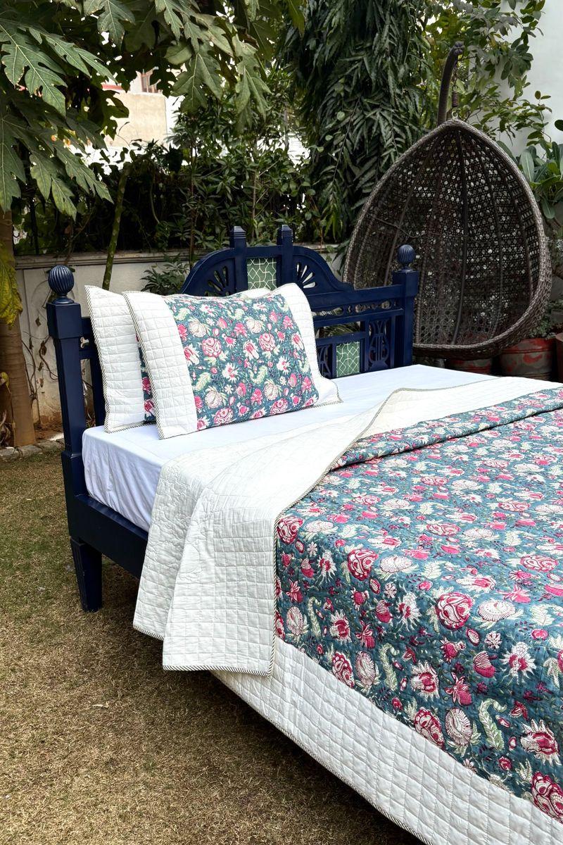 Handcrafted floral block print quilt with white cotton border, premium Indian bedding set