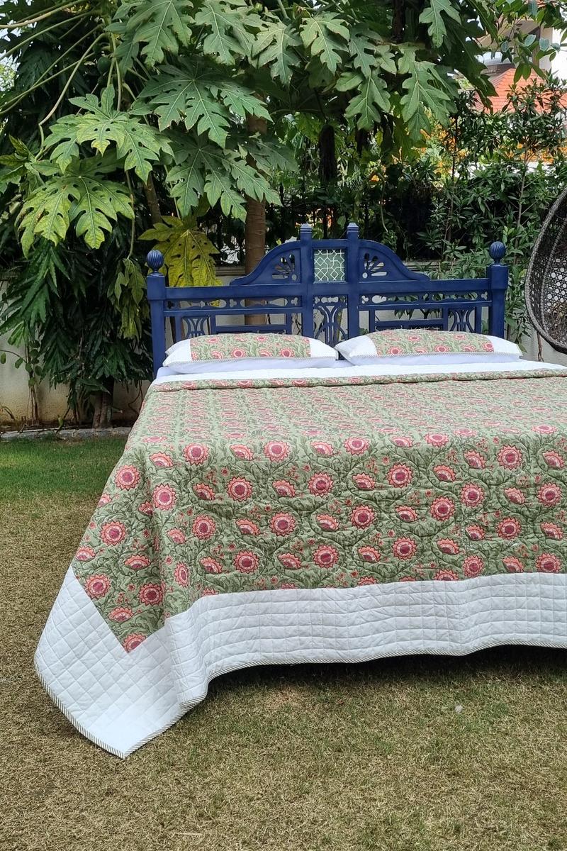 Lightweight summer quilted bedcover with pillows in green and pink handcrafted cotton