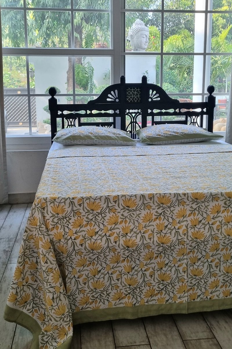 Matching floral block print pillow cover in yellow and green on soft cotton fabric