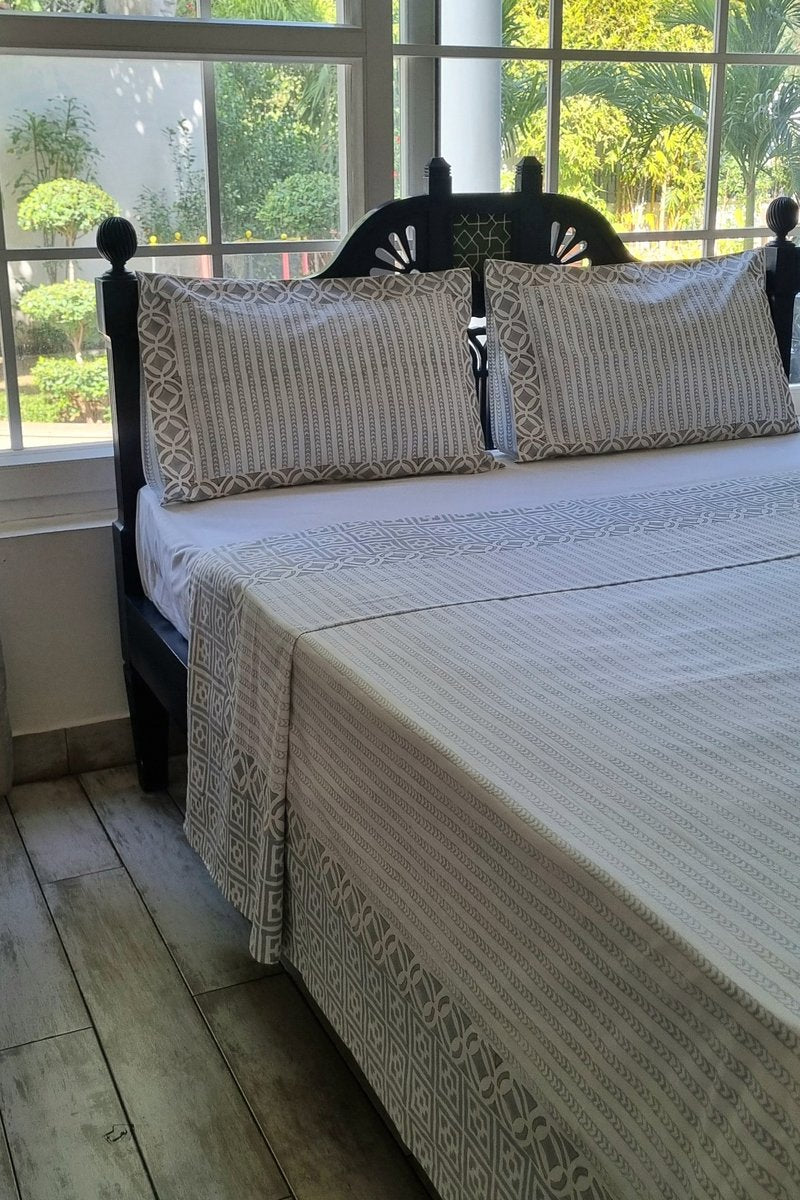 Premium Jaipur hand block print bedsheet in soft grey with traditional border pattern