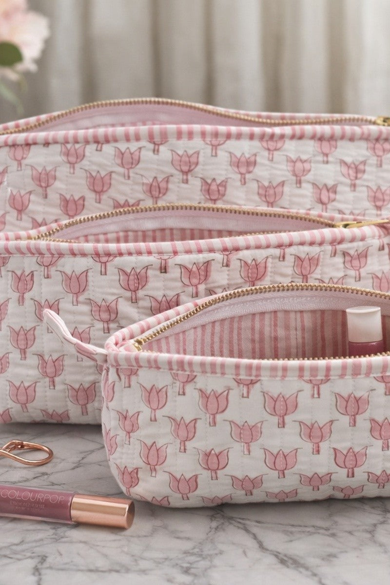 Lotus block print vanity kit with waterproof lining, quilted makeup pouch showing striped interior and cosmetic storage