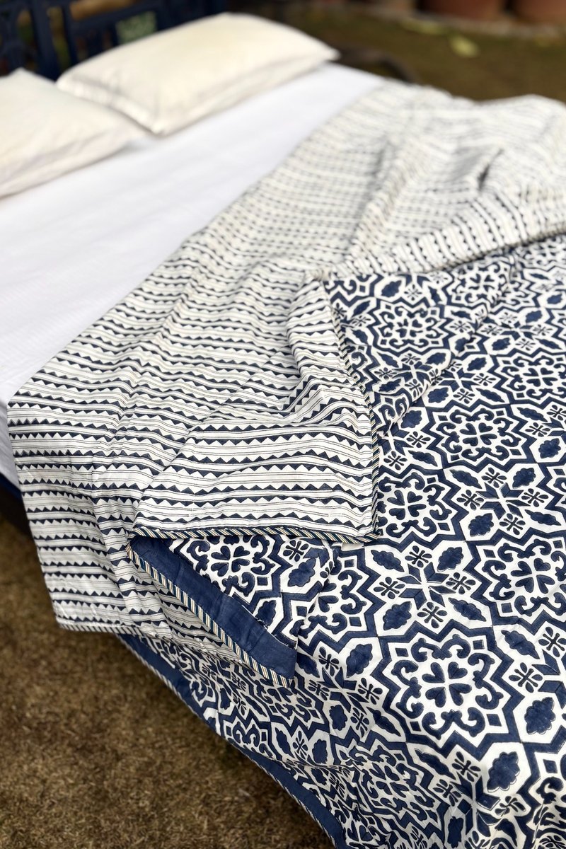 Blue and white geometric block print dohar with border detailing, luxury cotton bedspread India