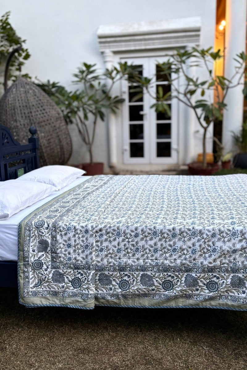 Elegant blue floral cotton dohar with Mughal inspired jaal and border, breathable summer bedding