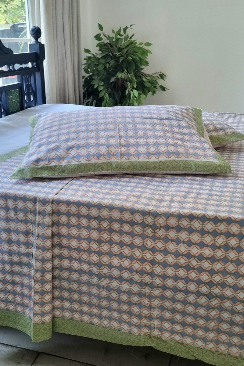 Close up of Parko geometric print cotton bedsheet with matching pillow covers