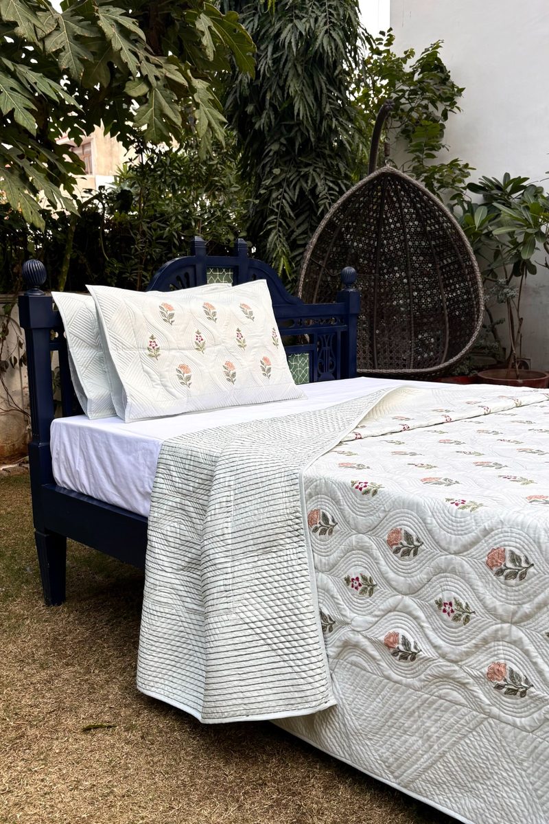 Floral hand block printed white quilt with soft cotton fill, premium Indian bedding