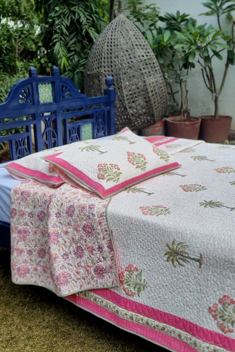Reversible tropical inspired block print bedcover with rani pink edging