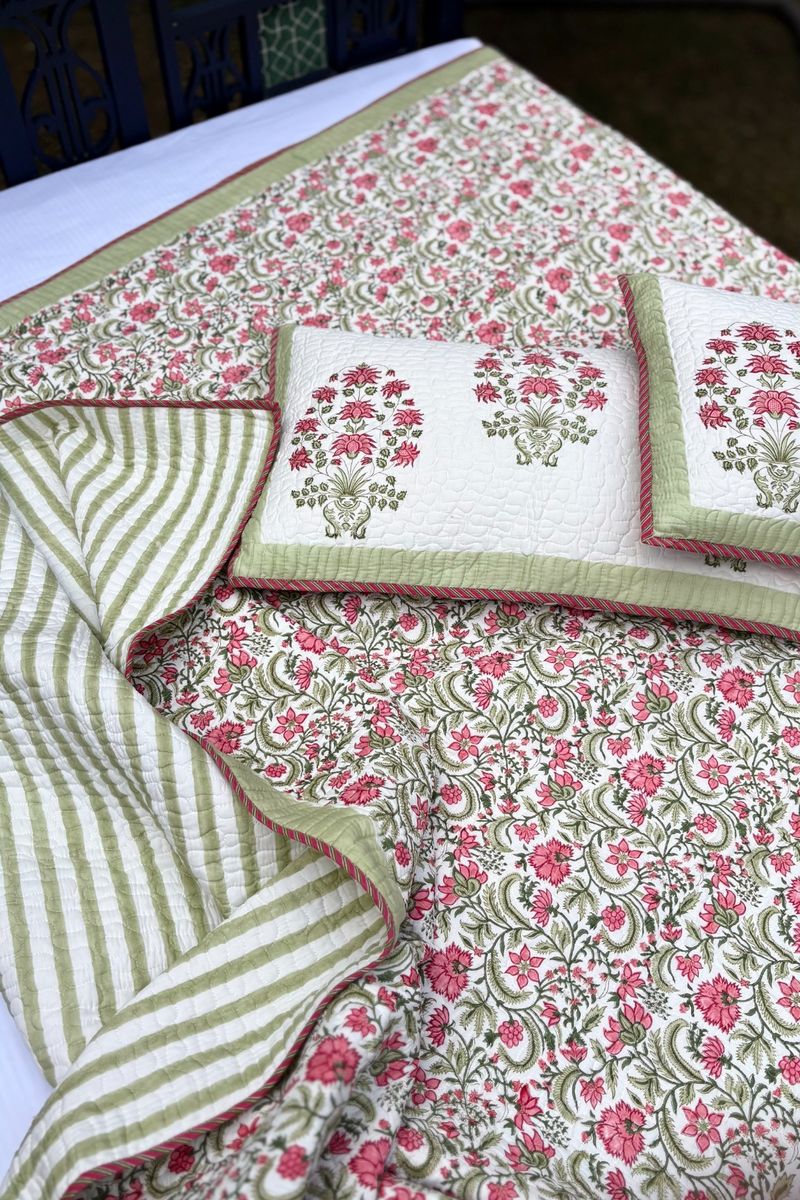 Jaipur hand block printed cotton quilted bedcover with all-over pink floral jaal pattern, reversible summer bedspread India