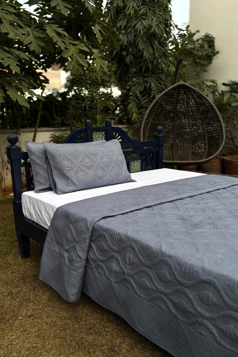 Ash Mist luxury quilted bedcover with detailed stitching and matching pillow covers
