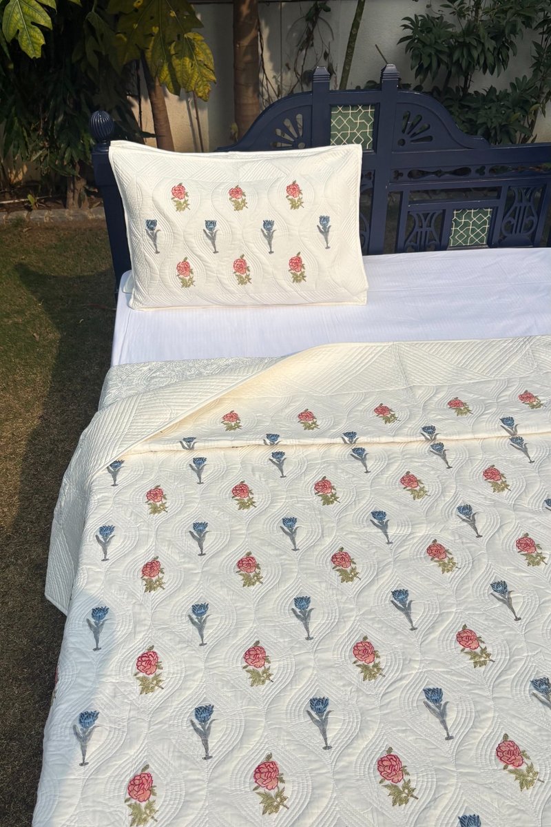 All-over floral hand quilted cotton quilt featuring Gulnaar Garden motif with delicate wave stitching
