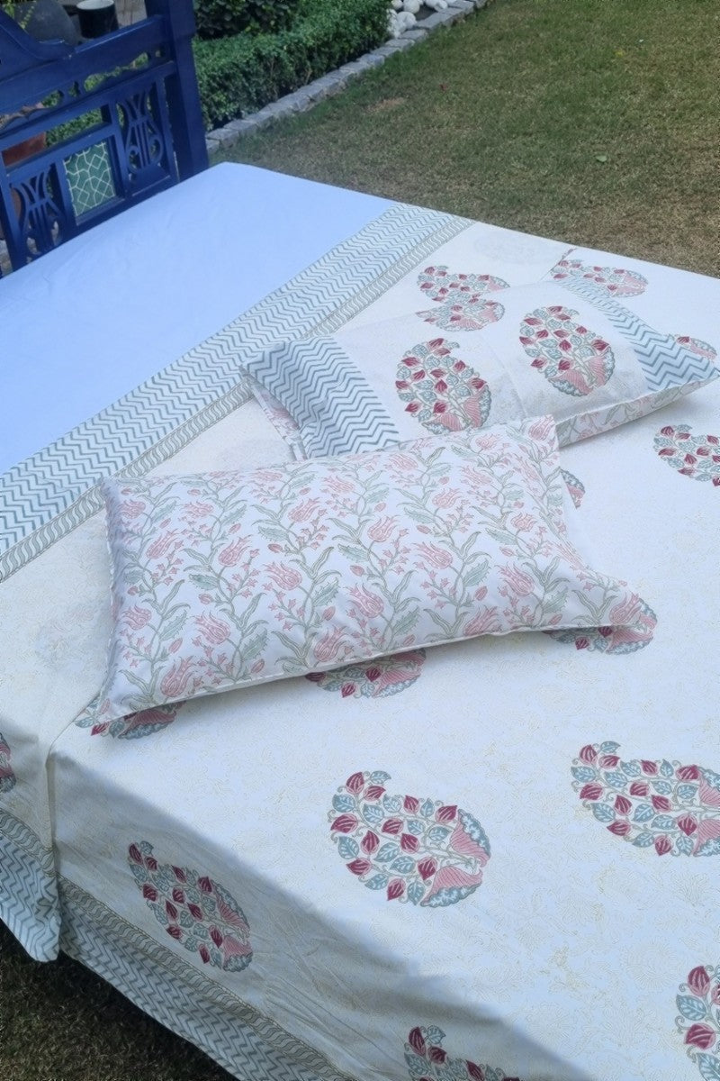 Elegant pastel bedsheet with matching pillow covers and traditional Jaipur floral motifs