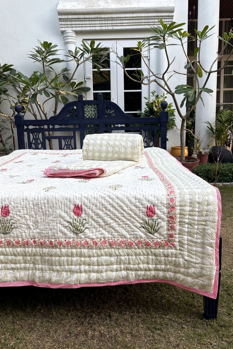 Luxury cotton quilt with blush tulip buta print and green jaal pattern border