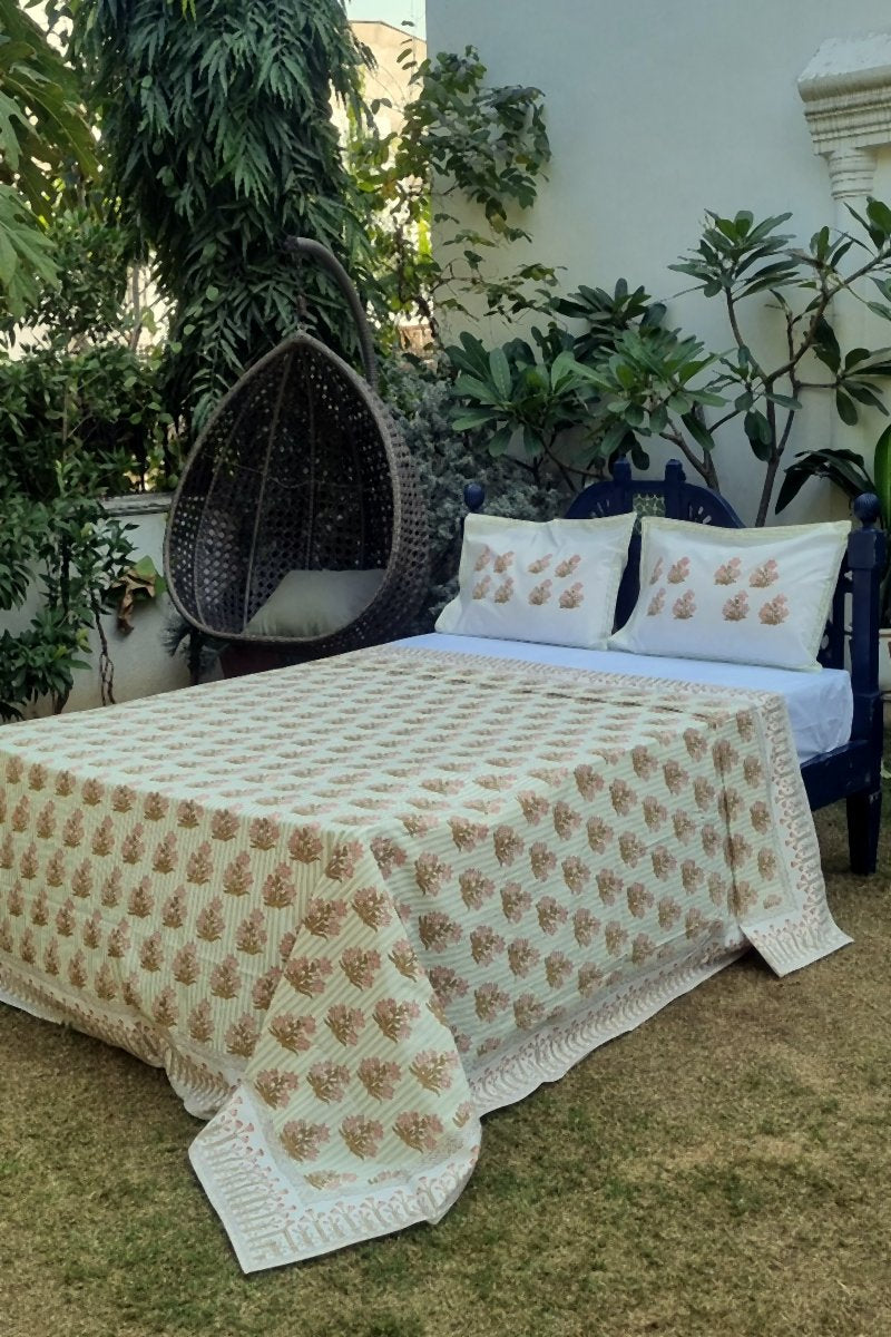 Matching striped cotton pillow cover in sage green with minimal hand block print pattern