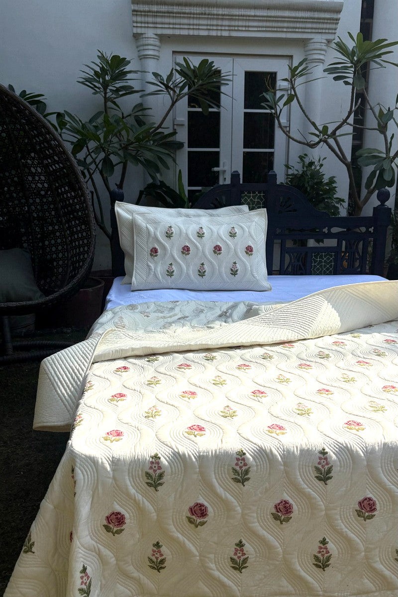 Reversible cream cotton quilt with pink rose hand block print and diamond quilted border, luxury lightweight bedspread